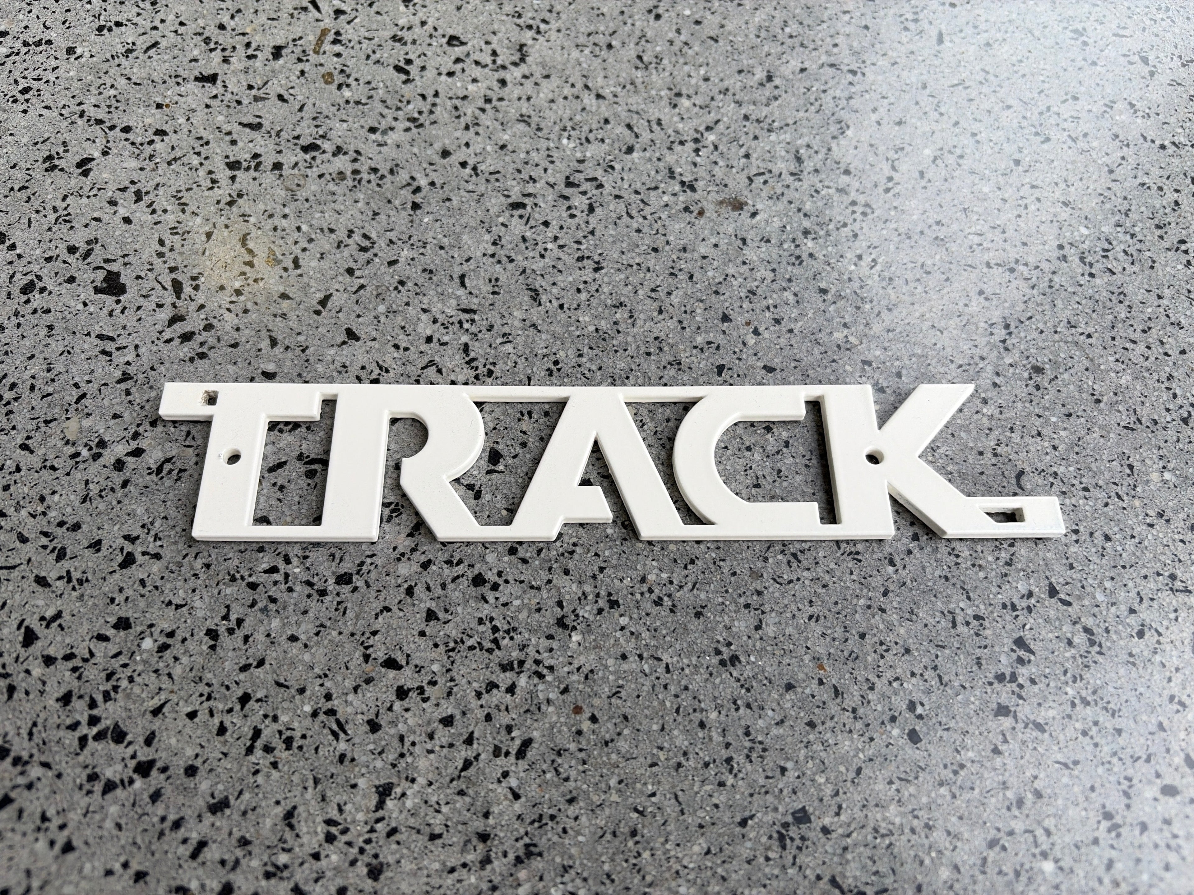 Track Logo - Anodic Off White